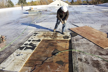 flat roof repair services tomah